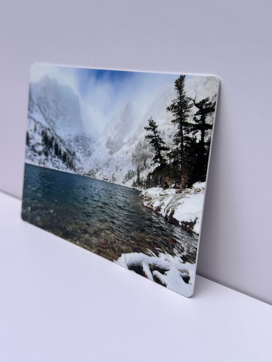 UV printed metal photo panel of a mountain lake, angled view showing the gloss finish
