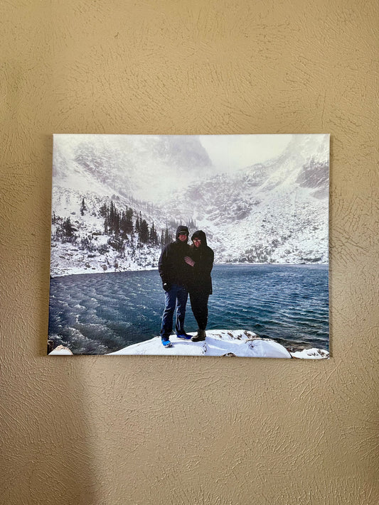 Custom stretched canvas print of a couple at a snowy mountain lake