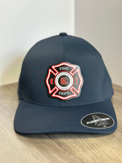 Navy Flexfit 180 Delta hat with a full-color fire department Maltese cross patch