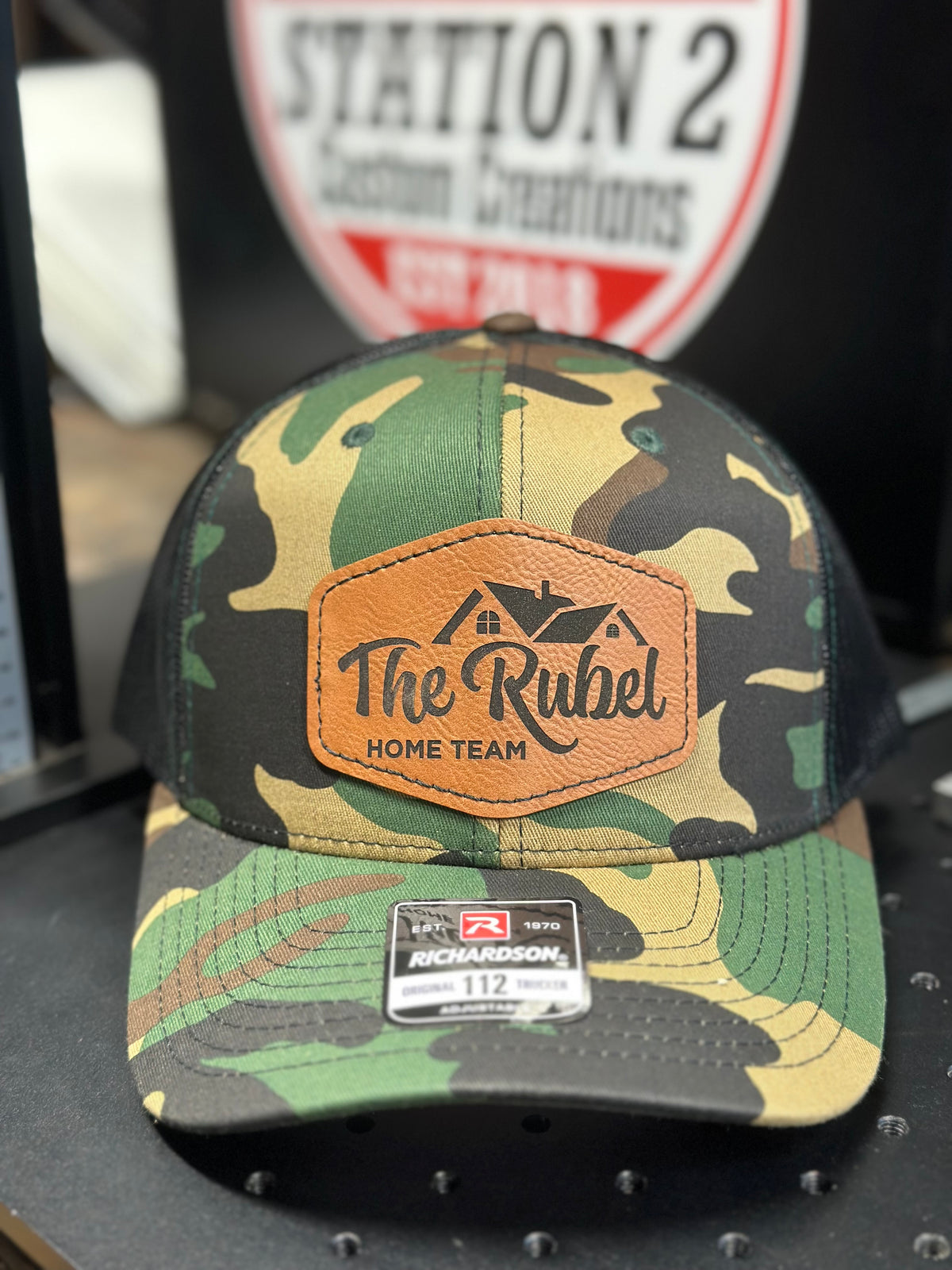Camo Richardson 112 trucker with engraved The Rubel leatherette patch