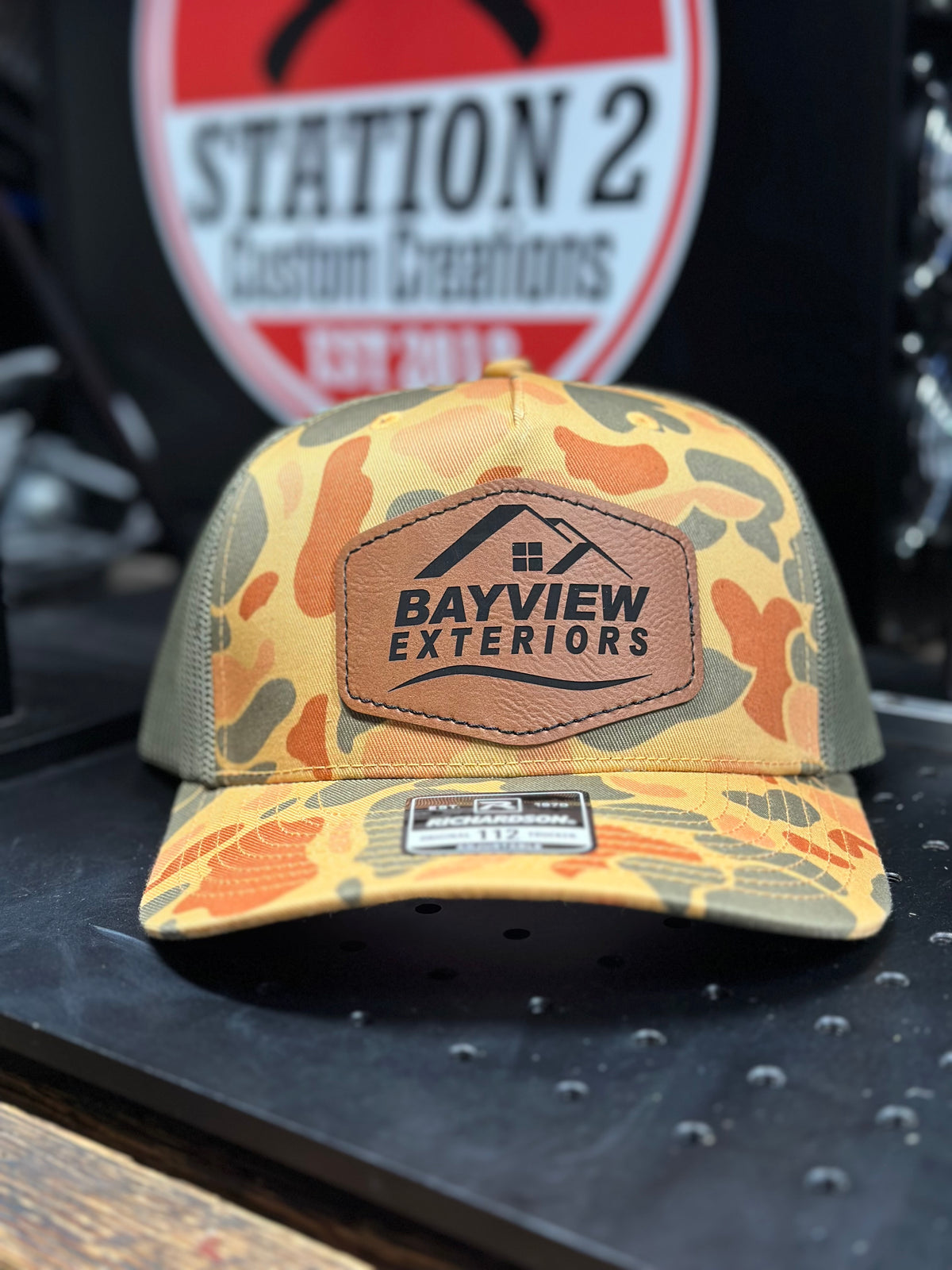 Harvest duck camo Richardson 112FP hat with engraved Bayview Exteriors patch
