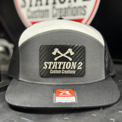 Grey and black Richardson 168 seven-panel hat with engraved Station 2 carbon patch