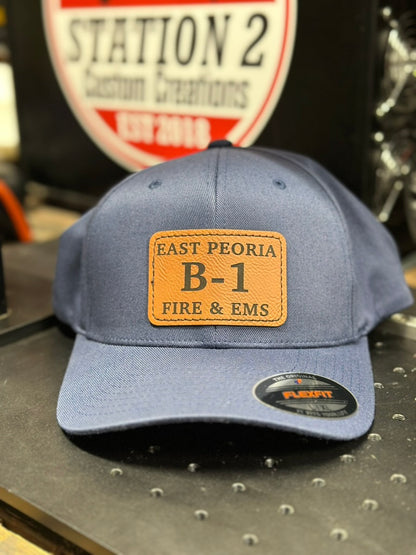 Navy Flexfit hat with engraved East Peoria Fire and EMS B-1 patch
