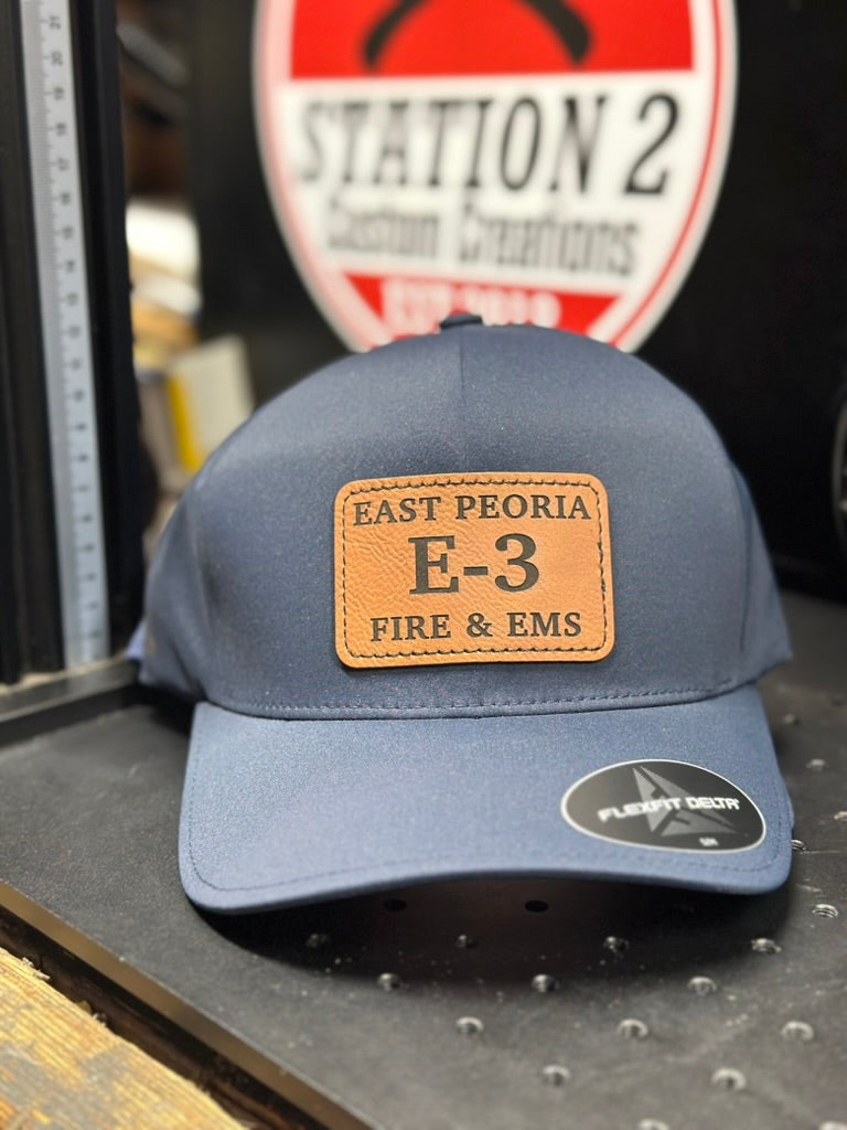 Navy Flexfit hat with engraved East Peoria Fire and EMS E-3 patch