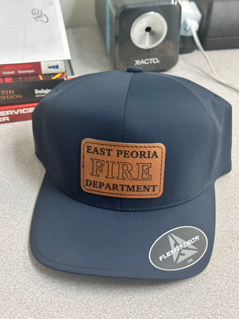 Navy Flexfit Delta hat with engraved East Peoria Fire Department patch