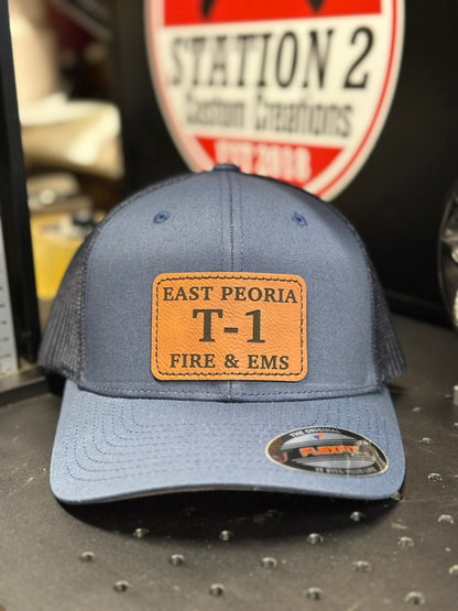 Navy Flexfit hat with engraved East Peoria Fire and EMS T-1 patch