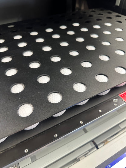 Golf ball jig for the Mimaki UJF-6042, empty, close-up of the holder pockets
